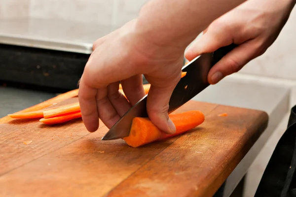 stock image Cook cut carrots