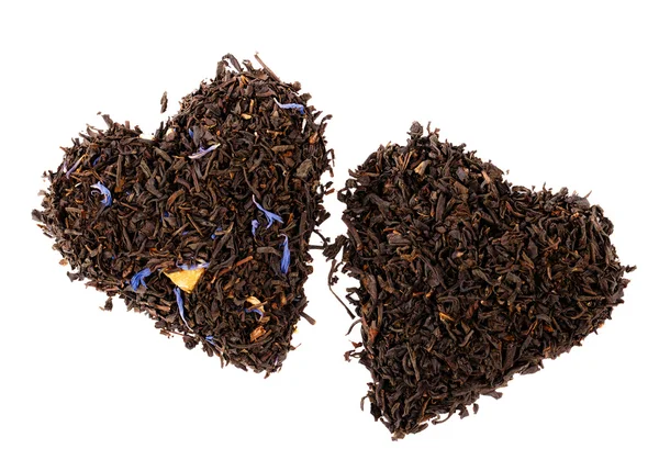 Earl Grey and Lady Grey black loose tea leaves in heart shape, i — Stock Photo, Image