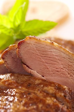 Smoked duck breast fillet, sliced clipart