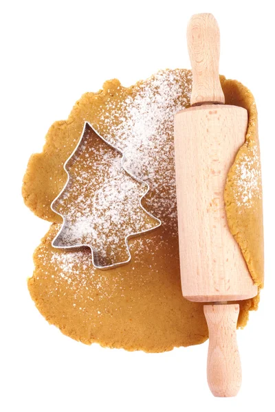 Christmas gingerbread tree cookie cutter on dough with rolling p — Stock Photo, Image