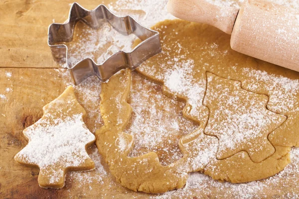 Christmas gingerbread tree cookies with cutter , dough and rolli — Stock Photo, Image