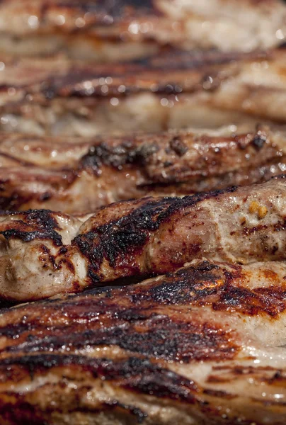 Seasoned pork chops ribs on a bbq — Stock Photo, Image