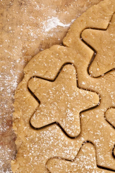 Gingerbread star cookie cuts dough, background — Stock Photo, Image