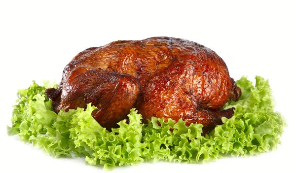 Homemade smoked whole chicken on leaf lettuce bed — Stock Photo, Image