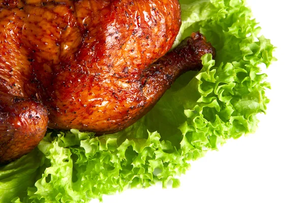 Homemade hot smoked quarter chicken on leaf lettuce bed — Stock Photo, Image