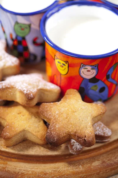Homemade gingerbread star cookies with kids milk, shallow dof — Stock Photo, Image