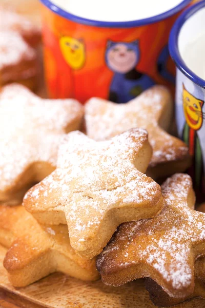 Gingerbread star cookies with kids milk — Stock Photo, Image