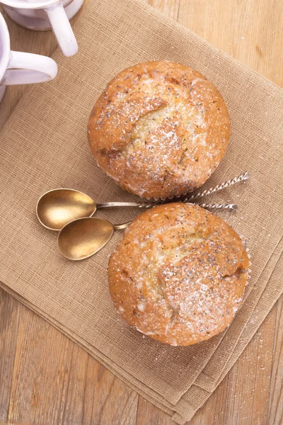 Poppy seed and lemon muffins in rustic style — Stock Photo, Image