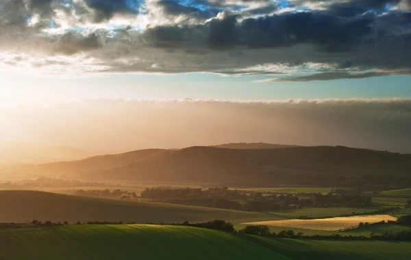 Beautiful English countryside landscape over rolling hills — Stock Photo, Image