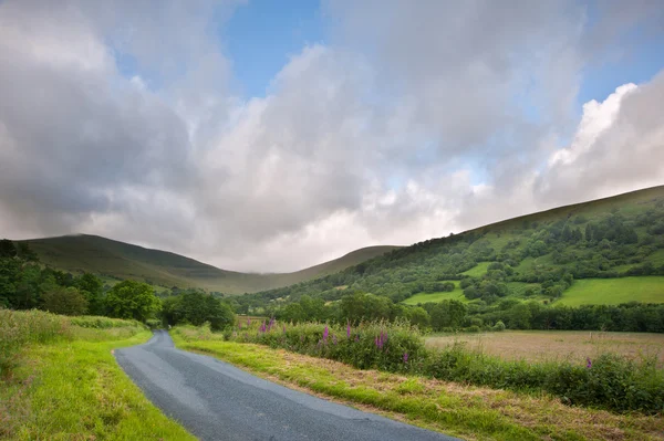 stock image Countryside landscape image across to mountains in distance with