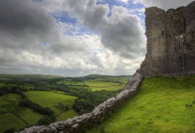 Ruined medieval castle landscape with dramatic sky clipart