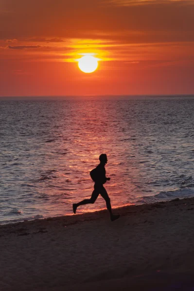 stock image Sunset beach runner