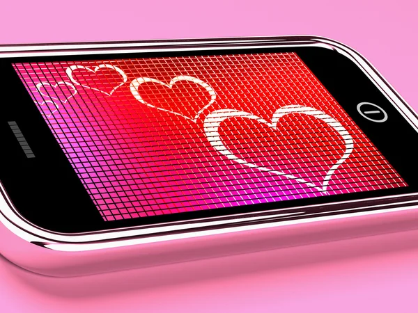 Hearts On Mobile Phone Screen Shows Online Dating — Stok fotoğraf