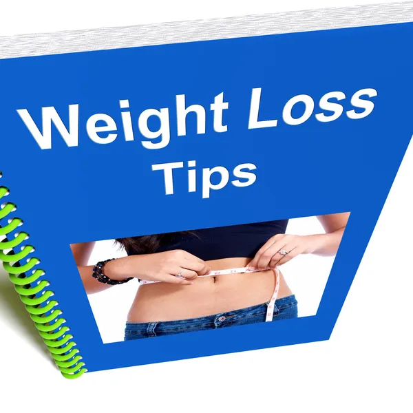 減量のヒントの本ダイエットのアドバイスを示しています — ストック写真