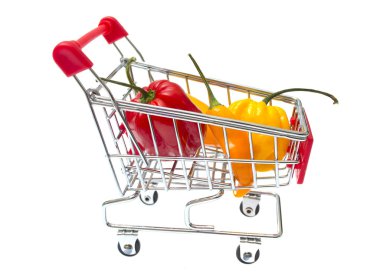 Red Shopping Cart with pepper Isolated On White