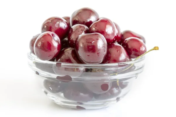 Cherry in glass bowl — Stock Photo, Image