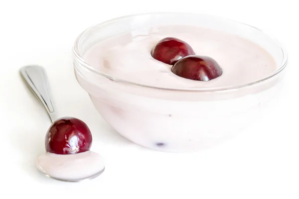 Glass bowl with Yogurt and cherries — Stock Photo, Image