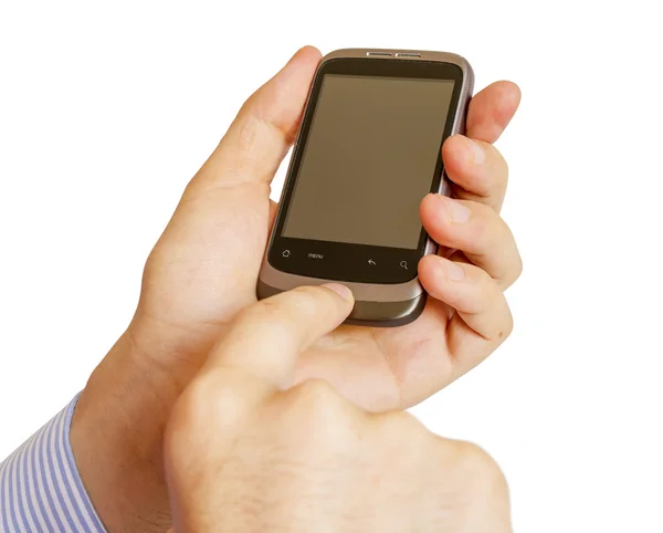 Держа мобильный смартфон в руке — стоковое фото