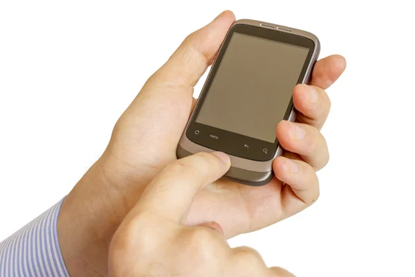 Håller smarta mobiltelefon i handen — Stockfoto