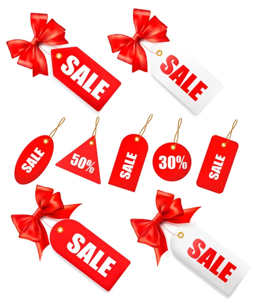Gran conjunto de etiquetas de ventas con lazo de regalo rojo y cintas — Vector de stock