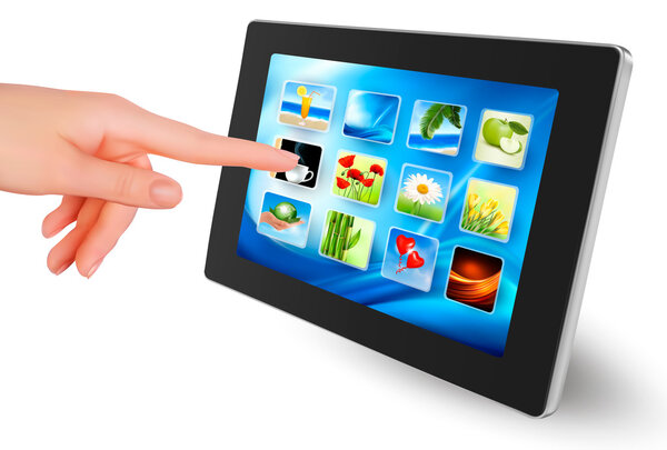 Hand touching icons on tablet.