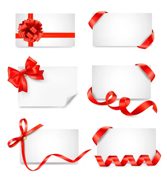 Set of card notes with red gift bows with ribbons — Stock Vector