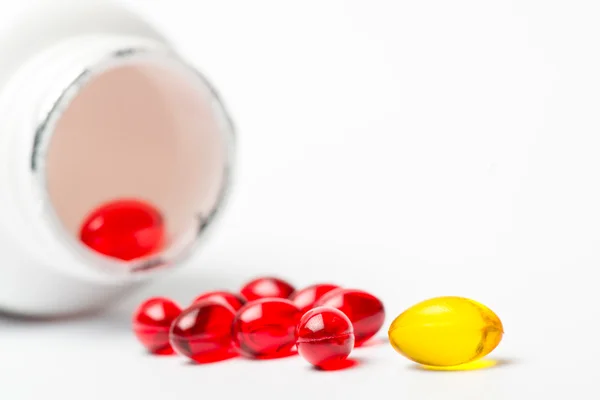 Comprimidos coloridos con cápsulas —  Fotos de Stock