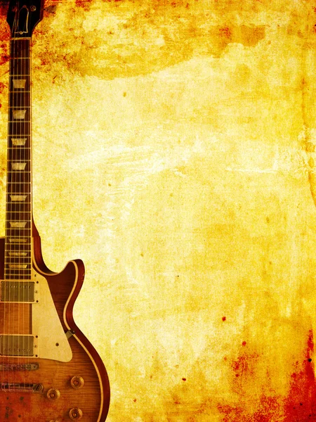Gitarre auf Grunge-Hintergrund — Stockfoto