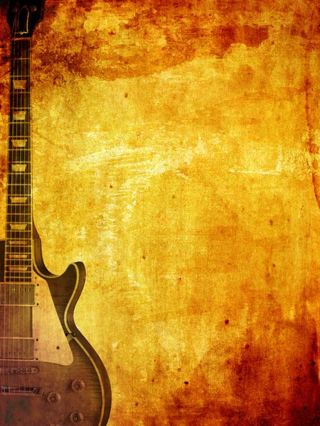 Guitarra sobre fondo grunge — Foto de Stock