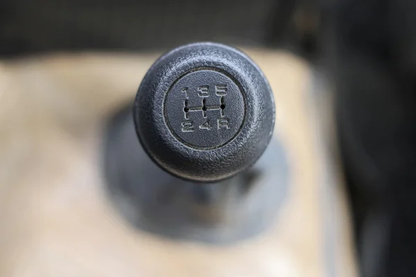 Stick shift with a black head inside auto — Stock Photo, Image