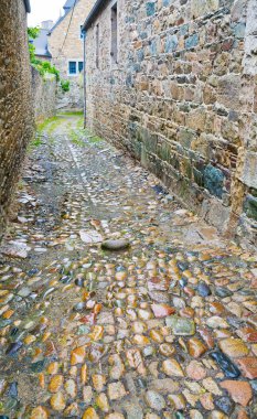 Old stone side street in Breton town clipart