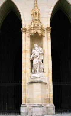 Statue in wall of Orleans Cathedral clipart