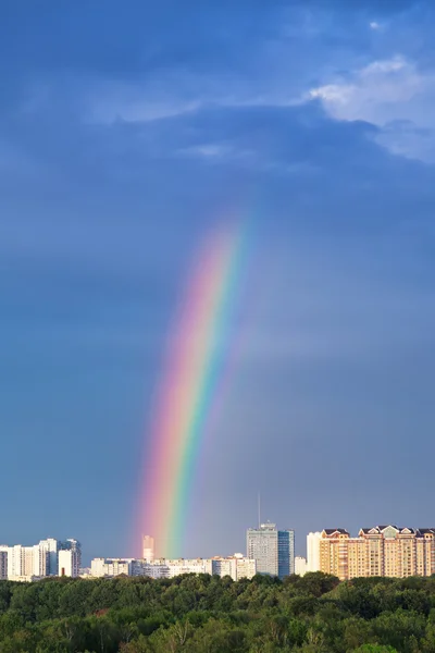 Rainbows under city — Stock Photo, Image