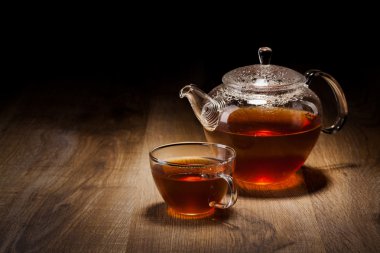 Tea Set on a Wooden Table clipart