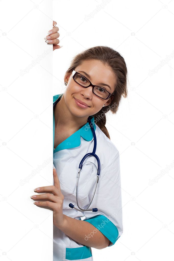 Smiling medical doctor woman holding blank billboard isolated on white