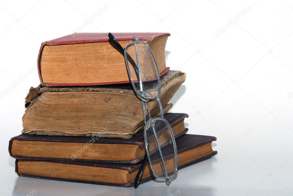 Stack books with glasses
