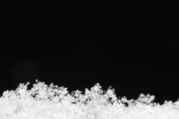 Sněhové krystaly ležící — Stock fotografie