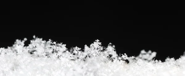 Snow crystals panoramic black — Stock Photo, Image