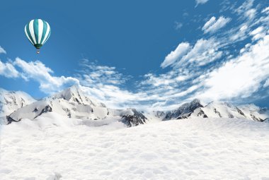 Hot air balloon is flying in the sky over the mountains with sno clipart