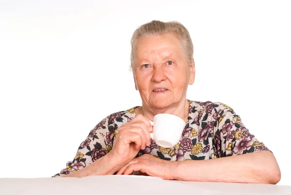 Büyükanne, masada — Stok fotoğraf
