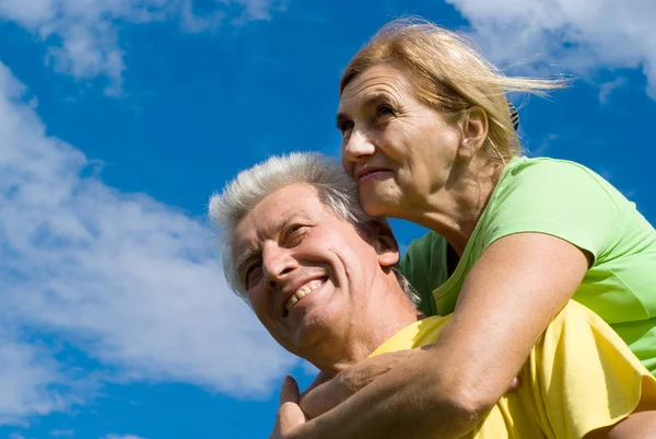 Old couple at a sky — Stock Photo, Image