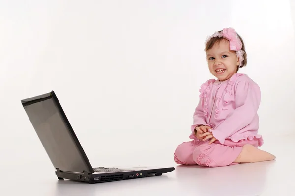 Kid have fun with notebook — Stock Photo, Image