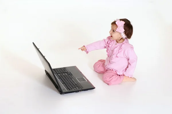 Kid have fun with notebook — Stock Photo, Image