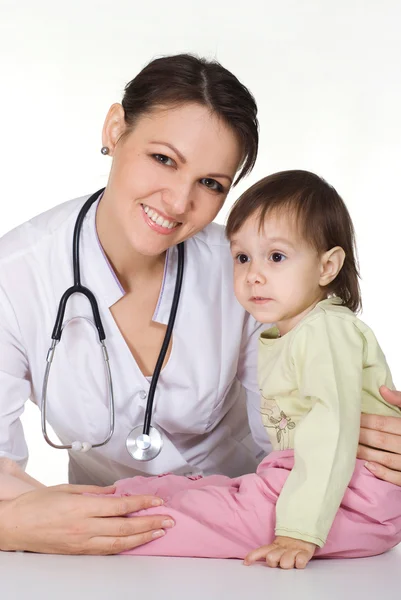 Verpleegster met baby — Stockfoto