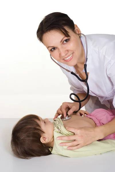 Enfermeira trabalha com criança — Fotografia de Stock