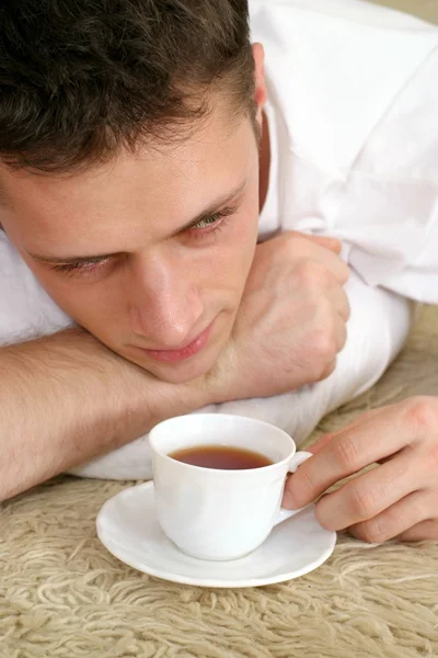 Cute guy with tea — Stock Photo, Image