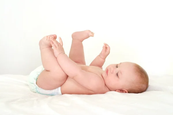 Söt baby liggande — Stockfoto