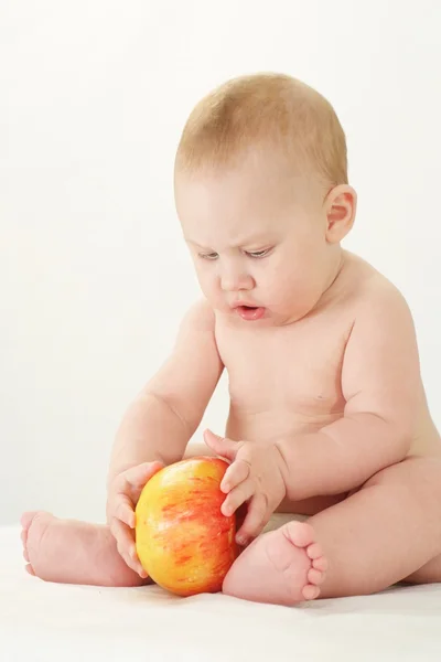 Baby with apple — Stock Photo, Image
