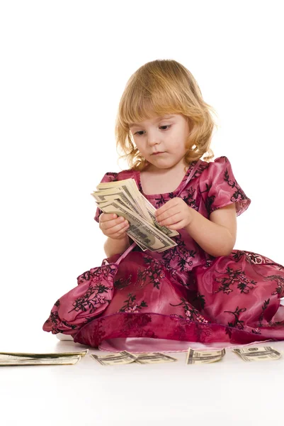 Beautiful little girl holding money — Stock Photo, Image