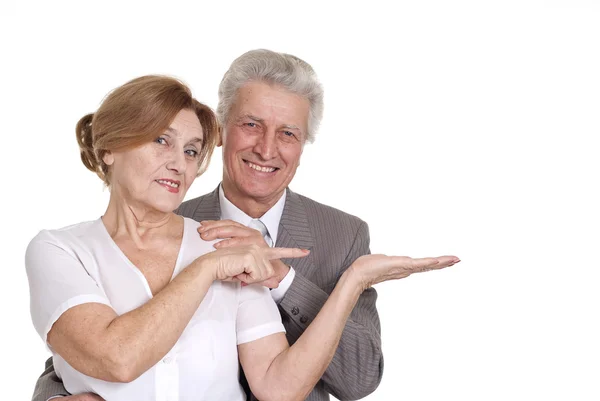En senior med en trevlig kvinna som står — Stockfoto